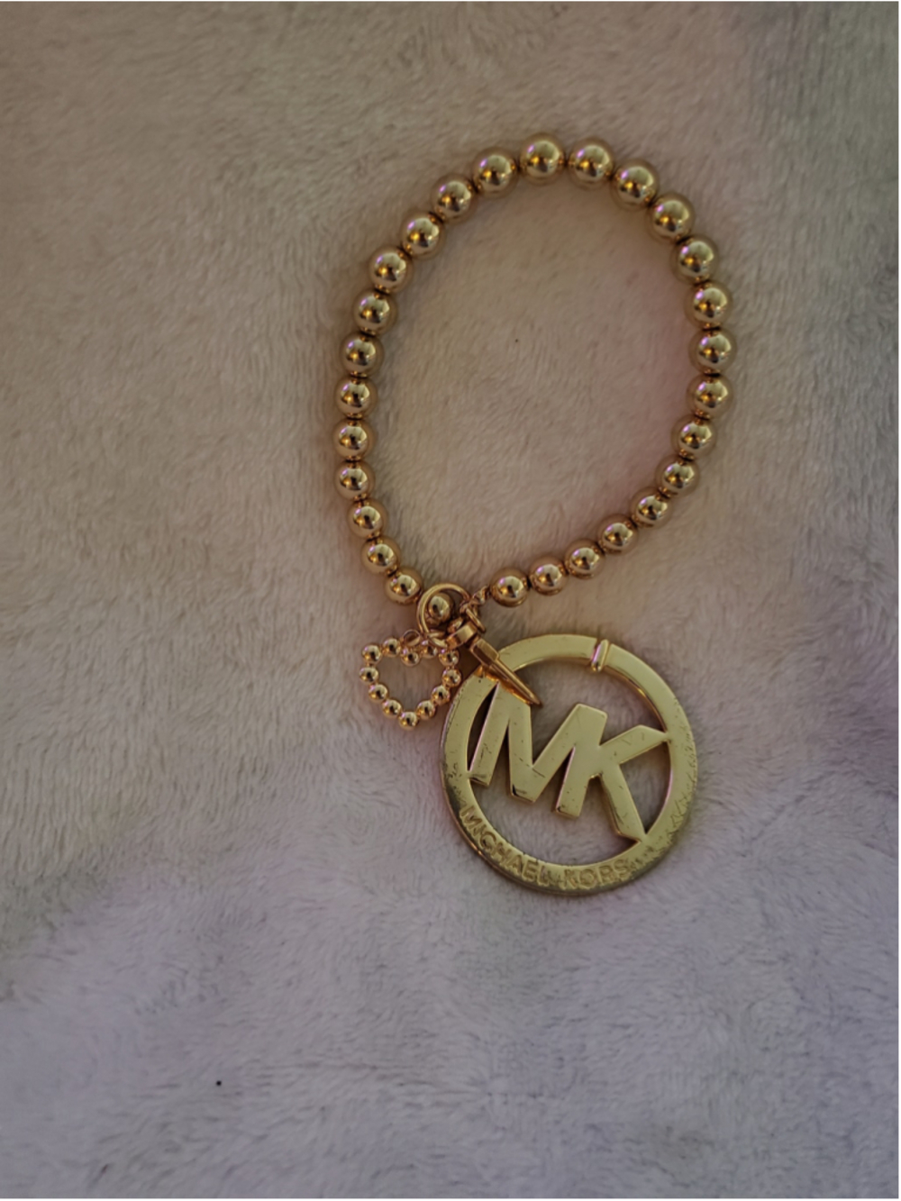 Michael Kors Gold Tone Bead bag charm